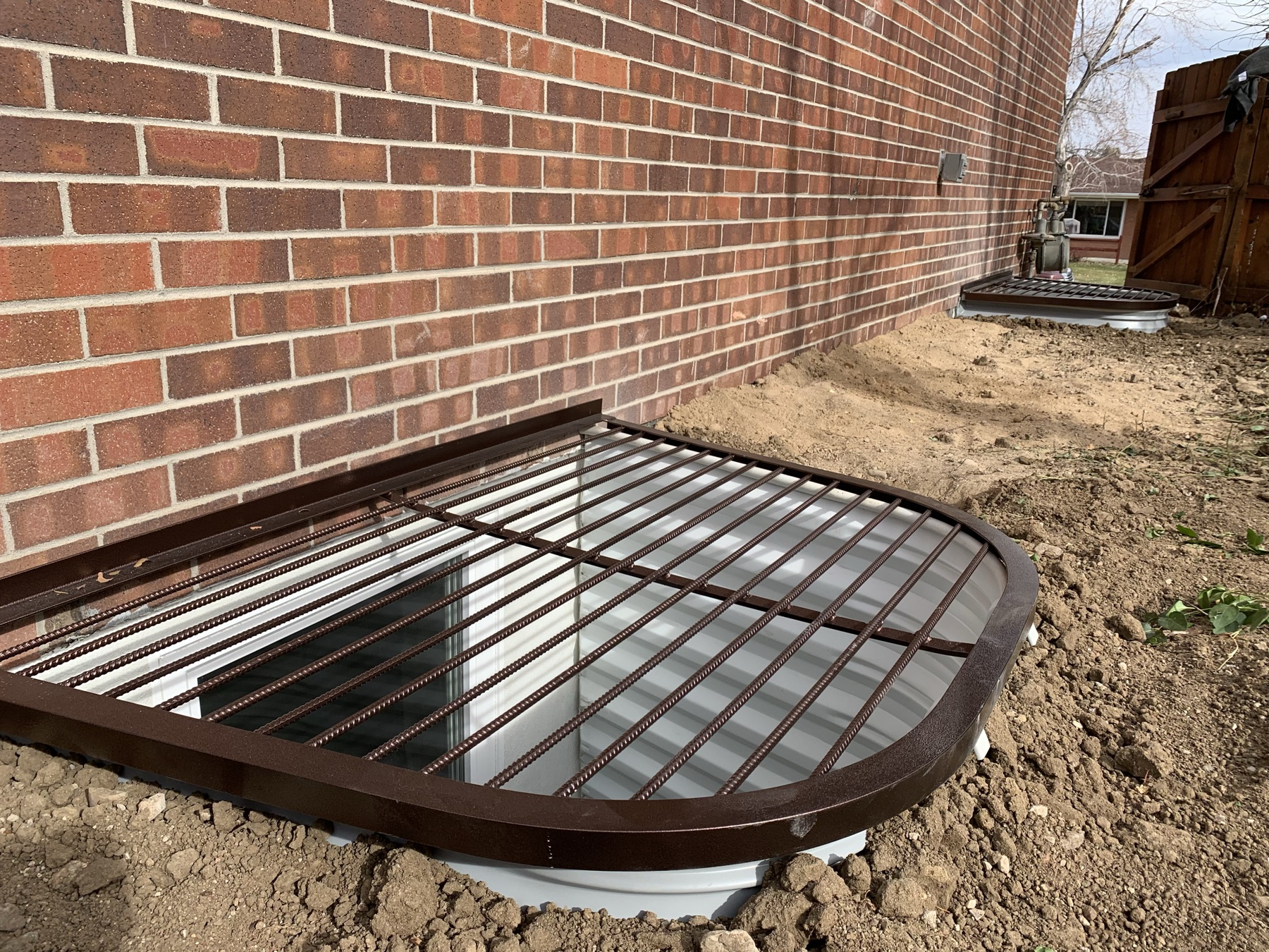 Egress window well grate cover installation Colorado